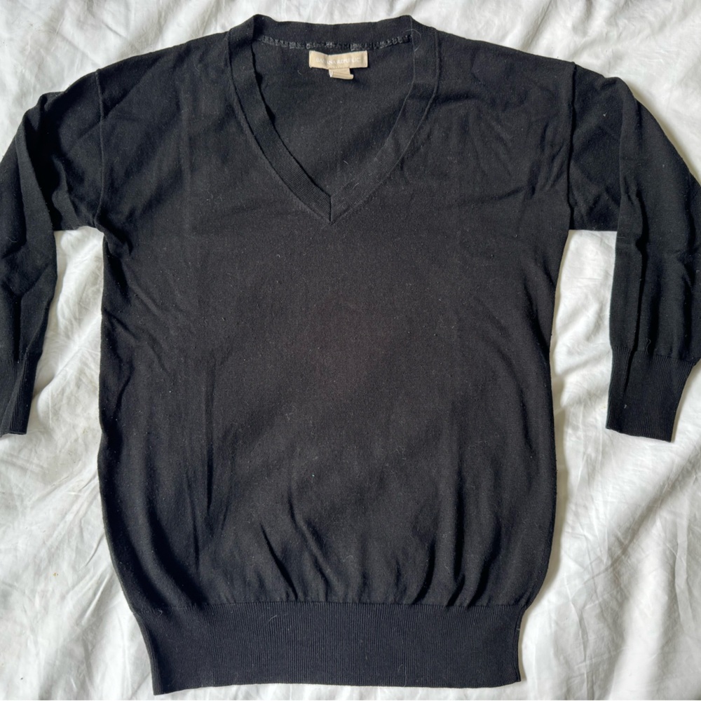 Black v-neck sweater. Very light wait.